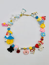 Phonstrap+collana+charm Alice e le sue meraviglie